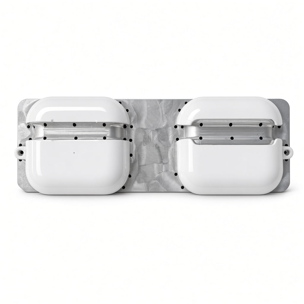 Dual-slot design presses two AirPods cases at once